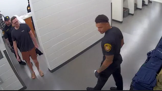 Chilling Footage: Accused Killer's Calm Demeanor as He Enters Jail After Double Murder