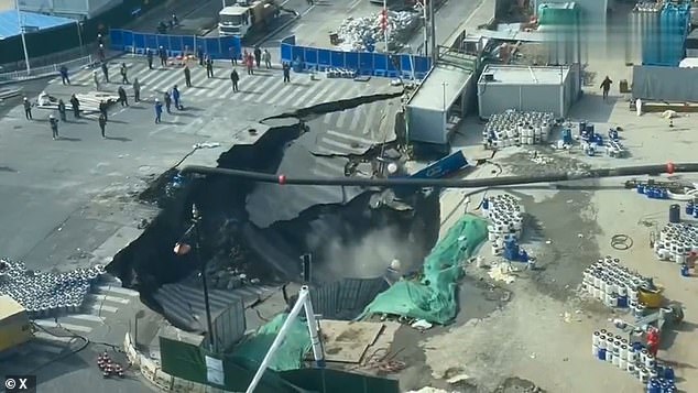 Shanghai Sinkhole Chaos: Devastating Collapse Swallows Road and Strands Workers
