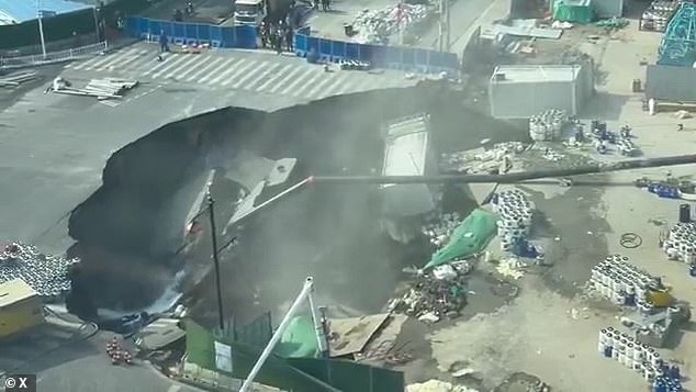 Shanghai Sinkhole Chaos: Devastating Collapse Swallows Road and Strands Workers