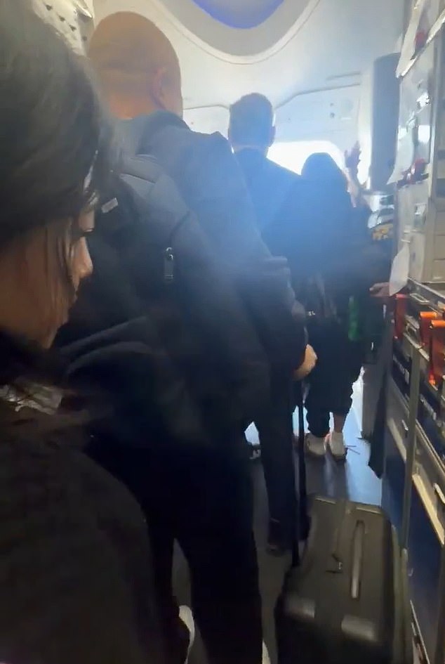 Chaotic Emergency Evacuation at LAX as Passengers Defy Safety Protocols by Dragging Luggage Down Slides