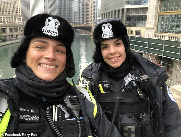 Body cam footage shows Chicago officer fatally shooting partner during apartment pursuit.