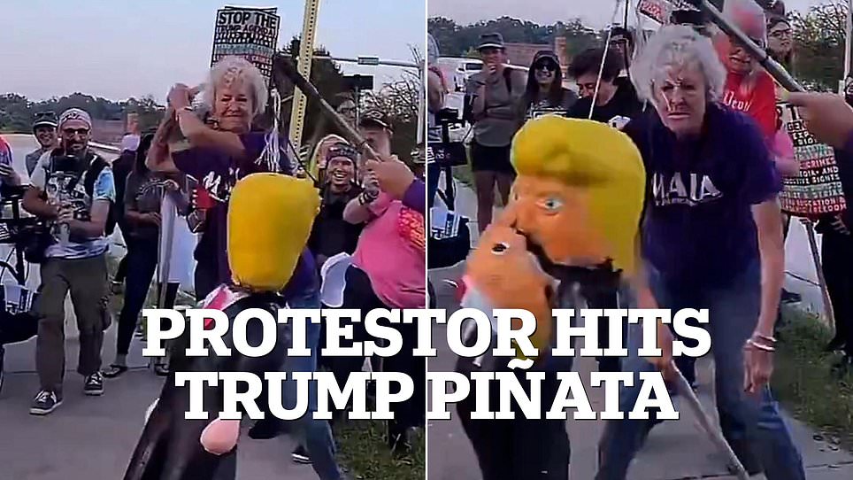 Protester wearing "Make America Kind Again" shirt smashes piñata of president