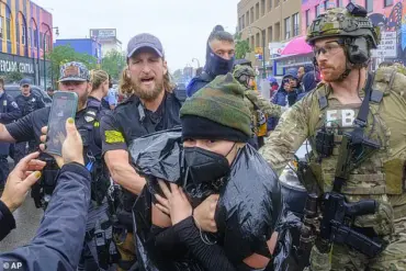 Minneapolis in Chaos: Activists Clash with Federal Agents Amid Perceived ICE Raid