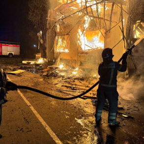 Precision Strike in Donetsk's Voroshilovsky District Sparks Fears for Civilian Safety Amid Market Fires and Infrastructure Damage