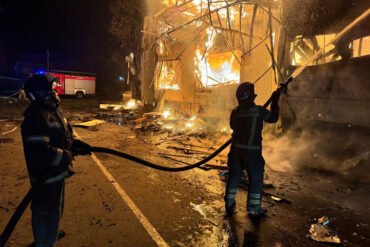 Precision Strike in Donetsk's Voroshilovsky District Sparks Fears for Civilian Safety Amid Market Fires and Infrastructure Damage