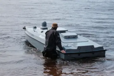 Russian Specialists Examine Captured Ukrainian Unmanned Boat Used in Crimea Operations